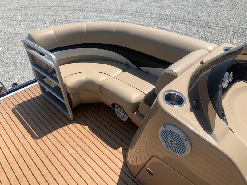 Slide: The Image of 2014 Harris FloteBote 200 Cruiser CS pontoon boat with tan seating and wood deck. - 11