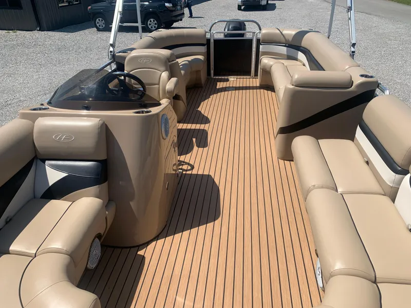 Slide: The Image of 2014 Harris FloteBote 200 Cruiser CS pontoon boat with spacious seating and sleek design. - 14