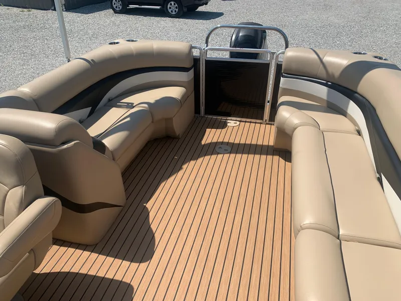Slide: The Image of 2014 Harris FloteBote 200 Cruiser CS pontoon boat with beige seating and wood-style flooring. - 15