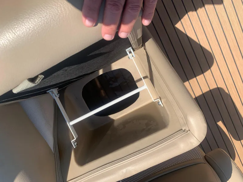 Slide: The Image of Open storage compartment in 2014 Harris FloteBote 200 Cruiser CS boat seat. - 16