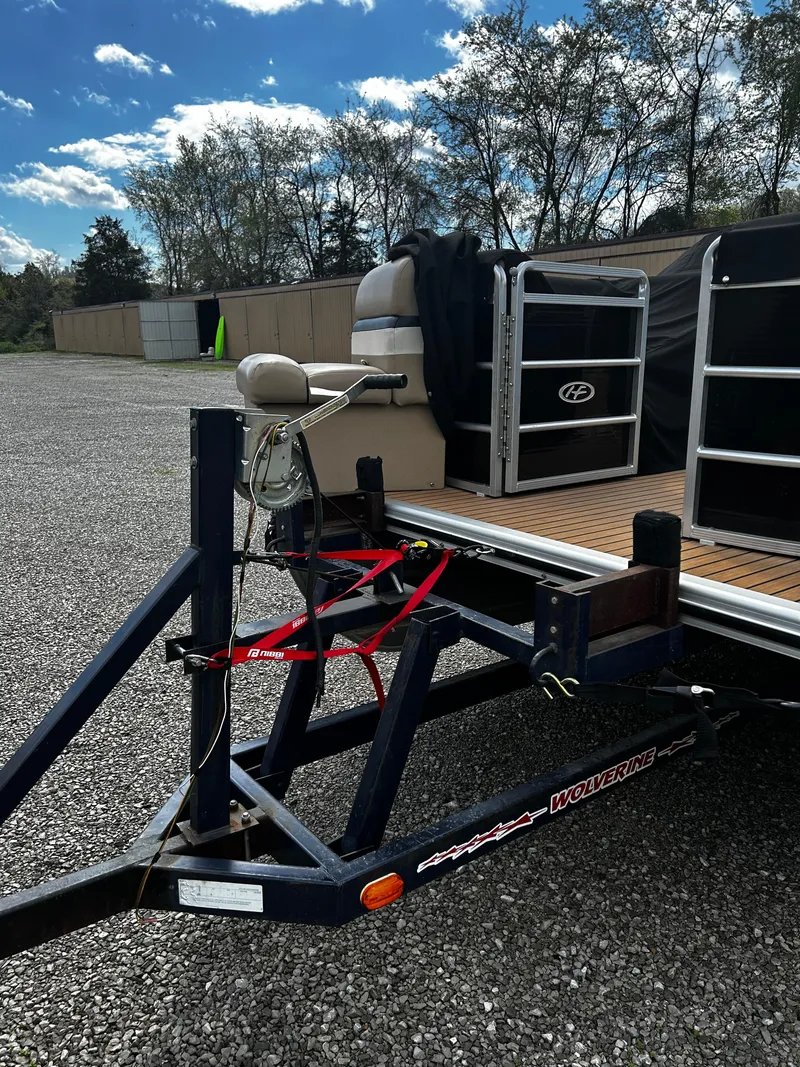 Slide: The Image of 2014 Harris FloteBote 200 Cruiser CS on a trailer, parked outdoors. - 20