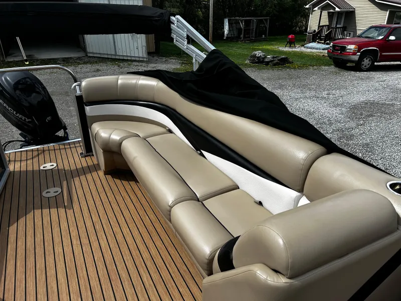 Slide: The Image of 2014 Harris FloteBote 200 Cruiser CS with beige seating and wood-style deck. - 6
