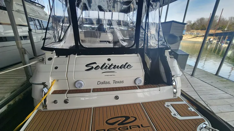 Slide: The Image of 2006 Regal Commodore 3560 IB yacht named "Solitude" docked in Dallas, Texas. - 12