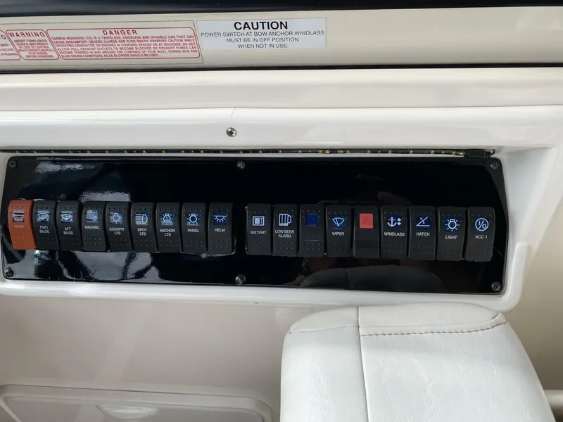 Slide: The Image of Control panel of a 2006 Regal Commodore 3560 IB boat with labeled switches. - 19