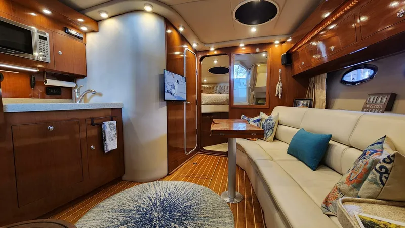 Slide: The Image of Luxurious interior of 2006 Regal Commodore 3560 IB yacht with modern amenities and elegant design. - 4