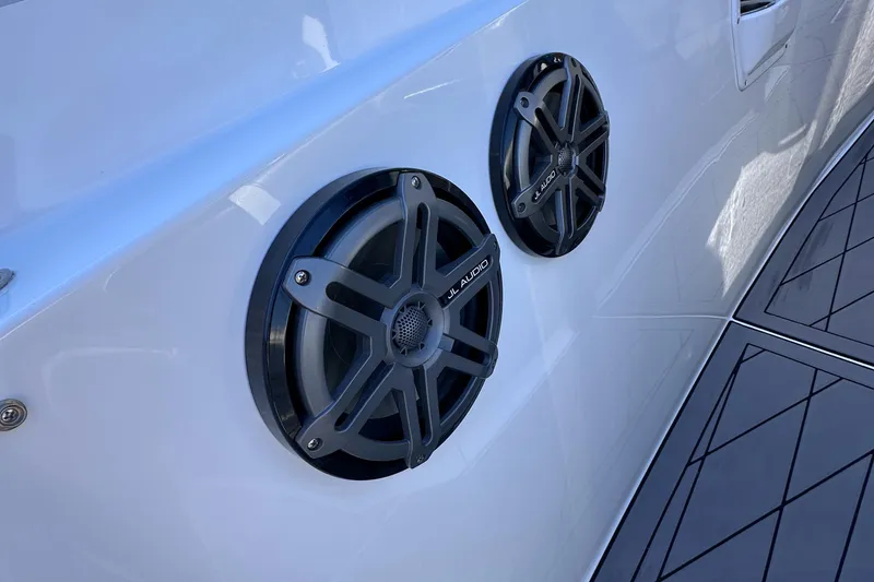 Slide: The Image of 2017 Sunsation 32 CCX boat with JL Audio speakers on the side panel. - 25