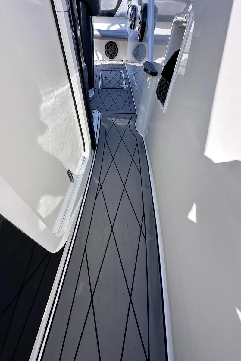 Slide: The Image of 2017 Sunsation 32 CCX boat deck with sleek, modern design and non-slip flooring. - 27