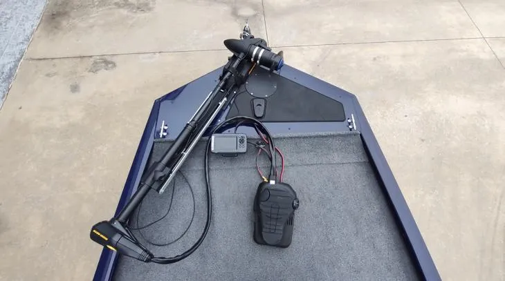 Slide: The Image of 2019 Tracker Pro 170 boat with trolling motor on carpeted deck. - 4