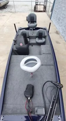 Slide: The Image of 2019 Tracker Pro 170 fishing boat with seating and equipment on deck. - 5