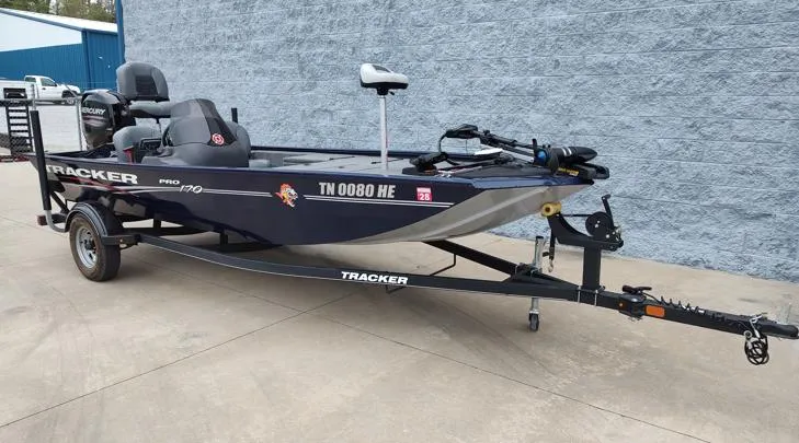Slide: The Image of 2019 Tracker Pro 170 fishing boat on trailer, parked outdoors. - 9