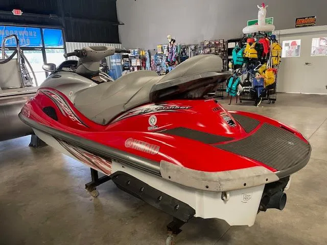 Slide: The Image of 2005 Yamaha WaveRunner FX Cruiser HO in showroom, red and gray design. - 4