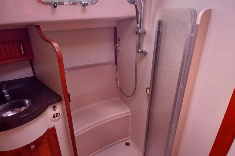Slide: The Image of Interior of 2006 Island Packet 440 yacht bathroom with shower and sink. - 37