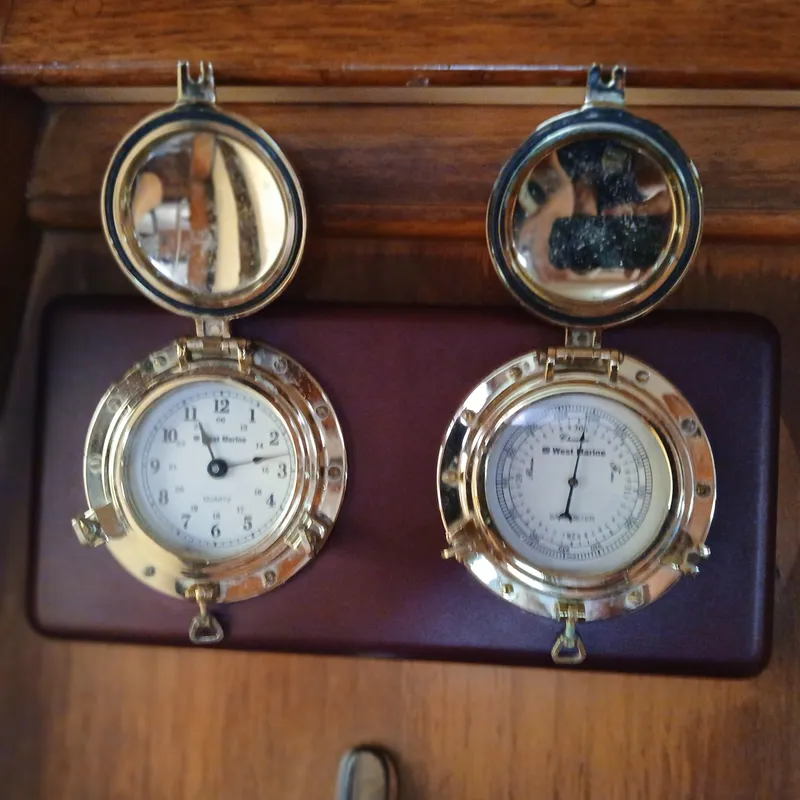 Slide: The Image of Brass nautical clock and barometer on 2006 Island Packet 440 yacht. - 45