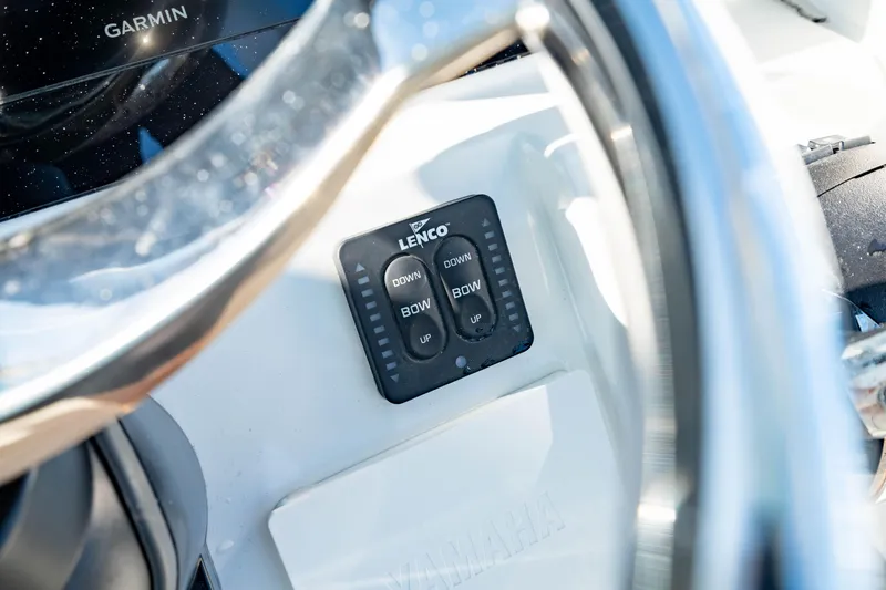 Slide: The Image of Close-up of Lenco control panel on 2022 Edgewater 262 CX boat dashboard. - 36