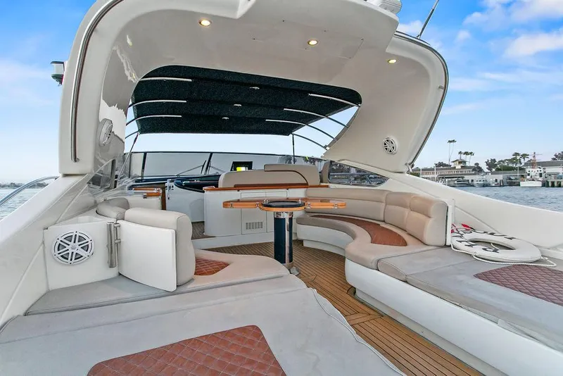 Slide: The Image of Luxurious 2004 Riva 59 Mercurius yacht with spacious seating and elegant design. - 12