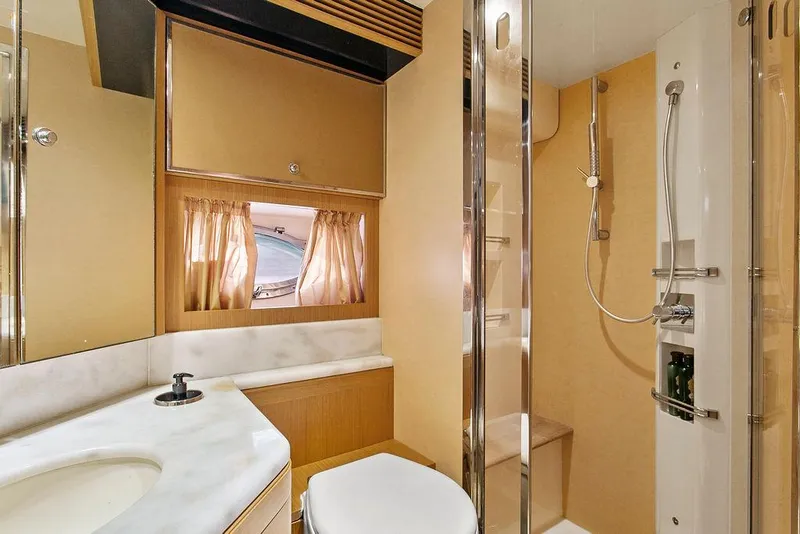 Slide: The Image of Luxurious bathroom interior of 2004 Riva 59 Mercurius yacht with modern fixtures. - 28