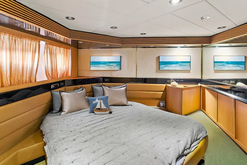 Slide: The Image of Luxurious cabin interior of 2004 Riva 59 Mercurius yacht with elegant decor and ocean-themed artwork. - 29