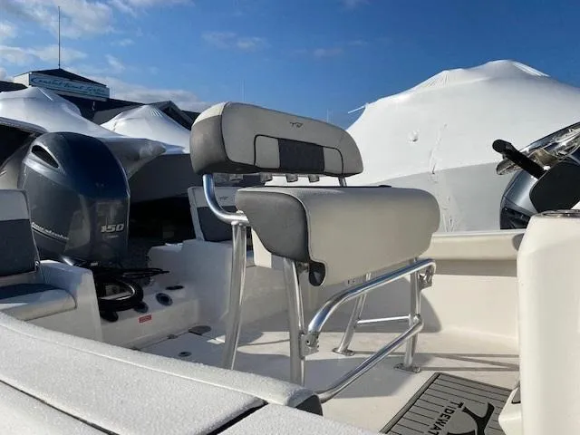 Slide: The Image of 2020 Tidewater 198CC boat with Yamaha 150 engine, featuring sleek seating and modern design. - 5