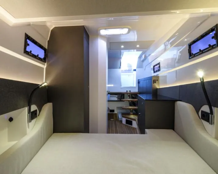 Slide: The Image of Luxurious interior of 2025 Pirelli 50 yacht, featuring modern design and ambient lighting. - 9