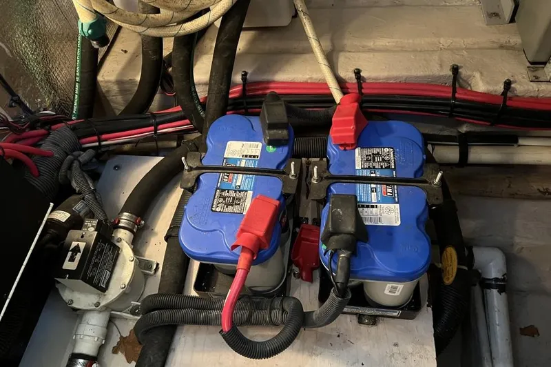 Slide: The Image of Batteries in a 2005 Sea Ray 390 Motor Yacht engine compartment. - 16