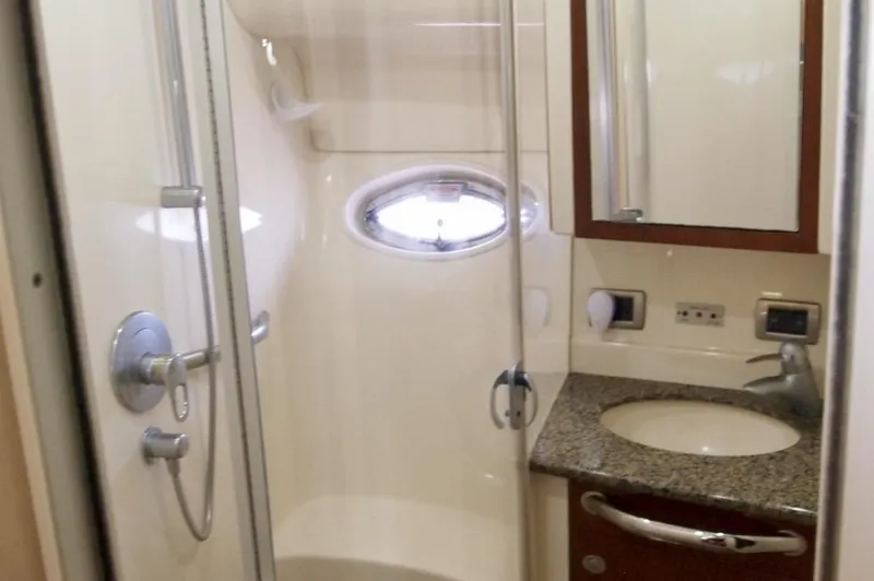 Slide: The Image of Bathroom interior of 2005 Sea Ray 390 Motor Yacht with shower and sink. - 25