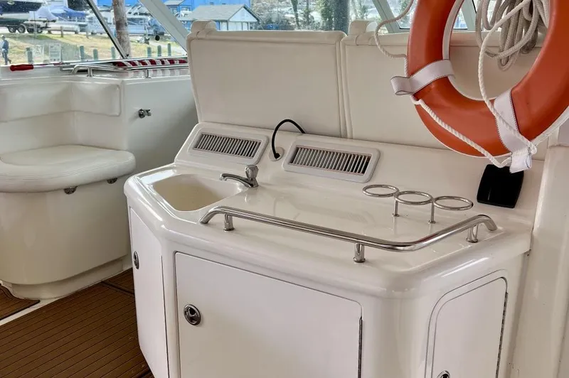 Slide: The Image of 2005 Sea Ray 390 Motor Yacht interior with sink and life preserver. - 9