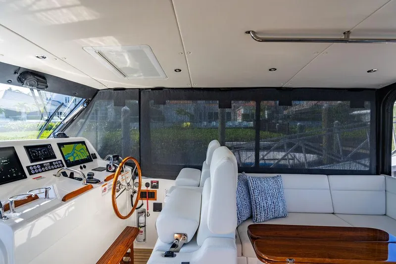 Slide: The Image of Interior of 2024 MJM 4 yacht with helm, seating, and navigation equipment. - 24