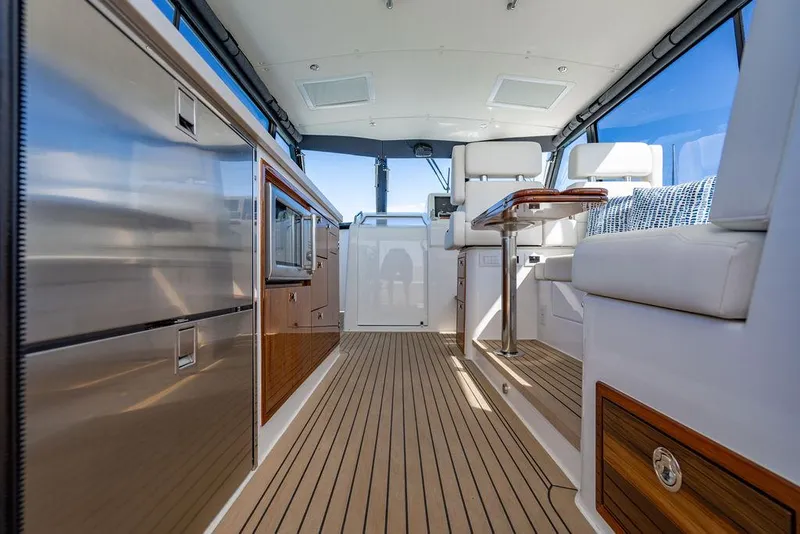Slide: The Image of Luxurious interior of 2024 MJM 4 yacht with modern kitchen and seating area. - 47