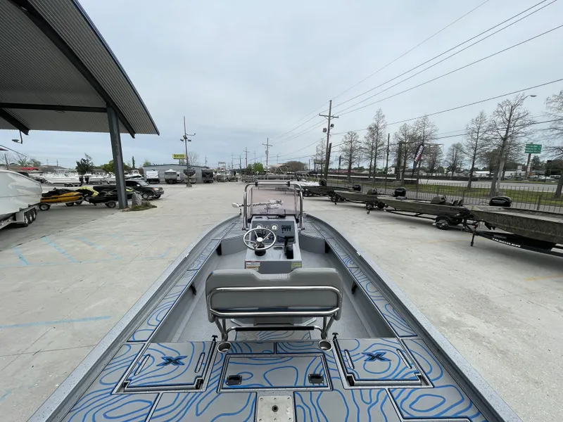 Slide: The Image of 2020 Xpress X23B boat displayed outdoors, showcasing sleek design and modern features. - 6