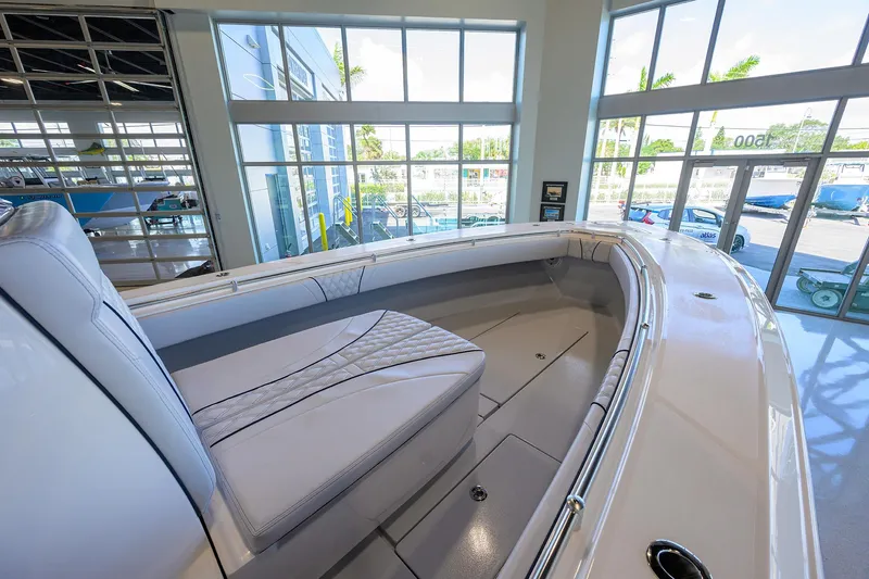 Slide: The Image of 2025 Contender 32 ST boat interior with sleek seating and modern design. - 16