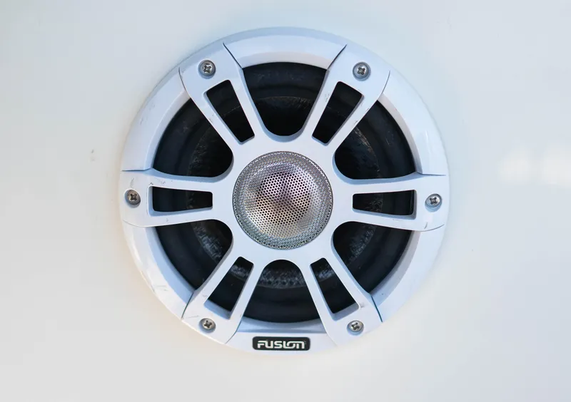 Slide: The Image of White Fusion speaker on 2019 Stingray 212 SC boat. - 24