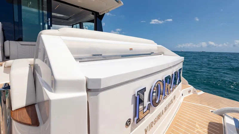 Slide: The Image of 2024 Tiara Yachts 48 LE on ocean, showcasing luxury design and craftsmanship. - 21