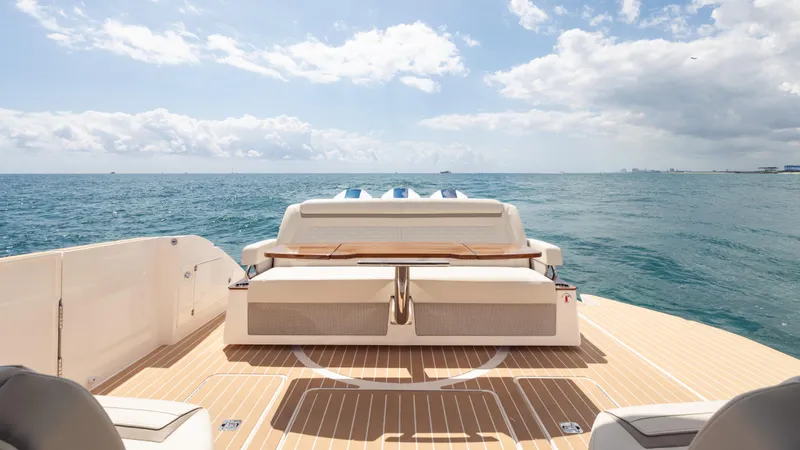 Slide: The Image of 2024 Tiara Yachts 48 LE luxury yacht deck with ocean view. - 26