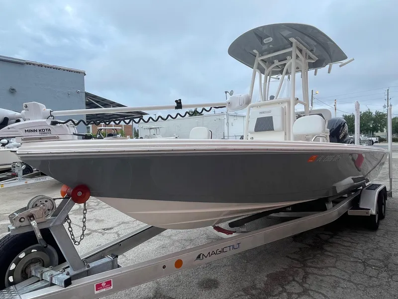 Slide: The Image of 2024 Pathfinder 2200 TRS boat on trailer, featuring sleek design and modern equipment. - 3