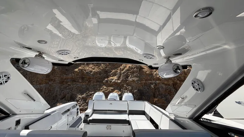 Slide: The Image of 2023 Monterey 385SS boat interior with sleek design, spacious seating, and modern amenities. - 11
