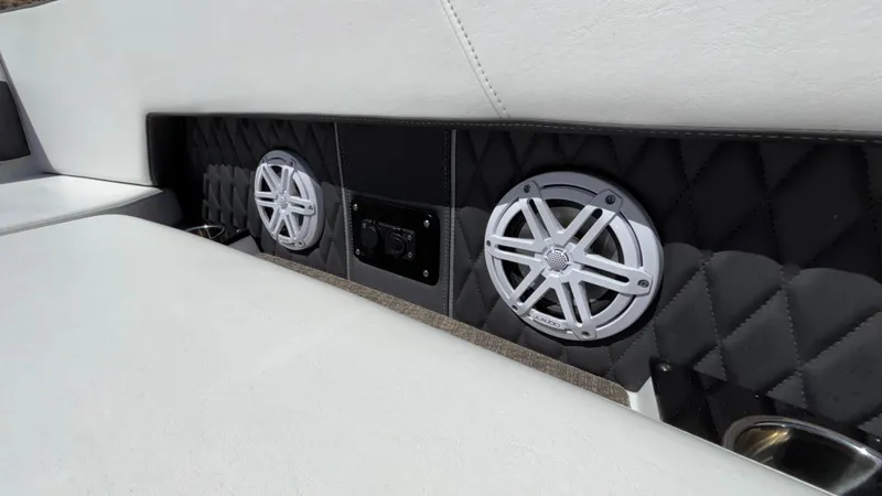 Slide: The Image of 2023 Monterey 385SS boat interior with speakers and quilted paneling. - 28