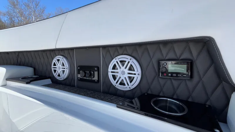 Slide: The Image of 2023 Monterey 385SS boat interior with speakers and control panel. - 41
