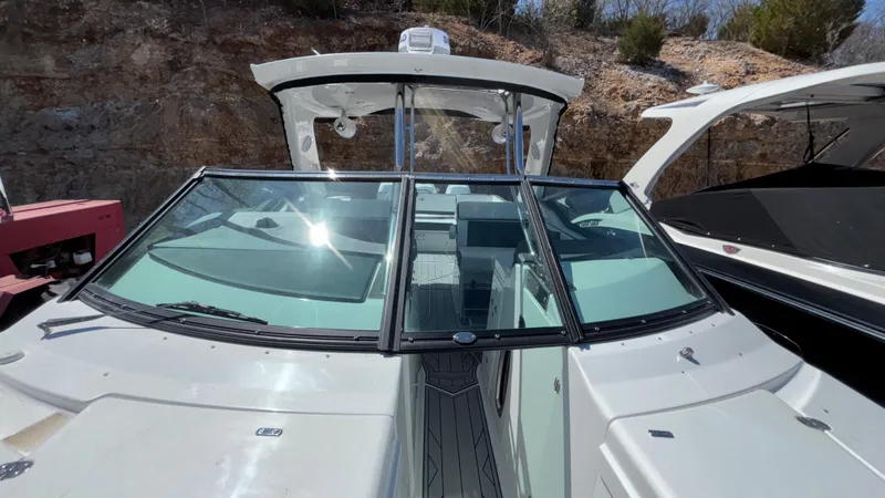 Slide: The Image of 2023 Monterey 385SS boat docked, featuring sleek design and spacious interior. - 42