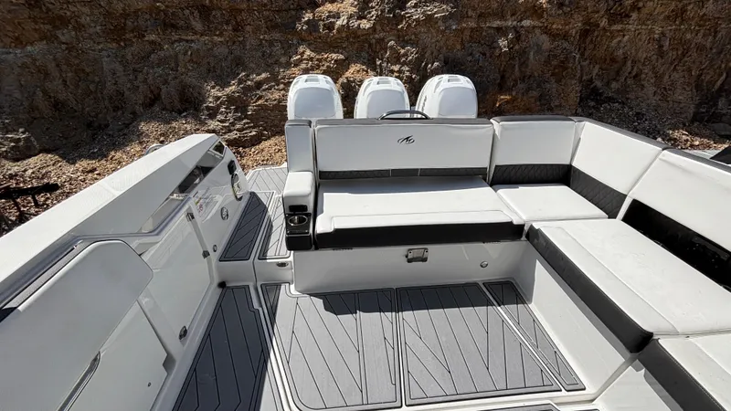 Slide: The Image of 2023 Monterey 385SS boat interior with sleek seating and modern design. - 5