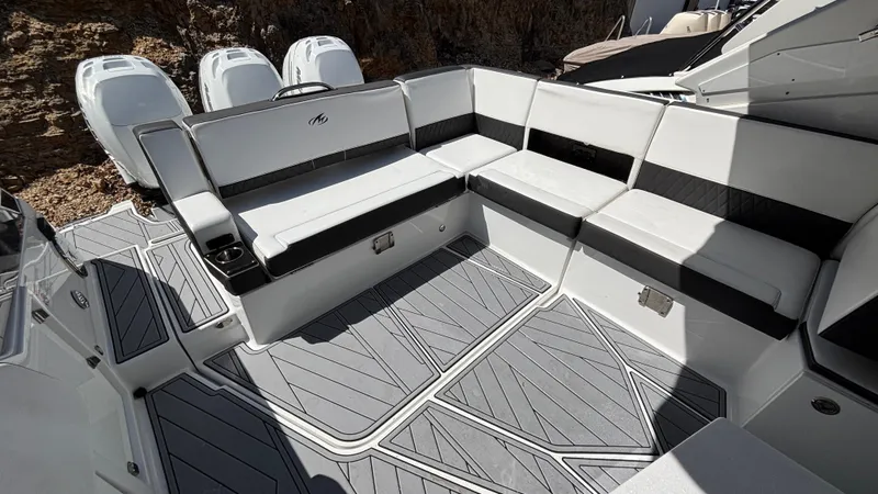 Slide: The Image of 2023 Monterey 385SS boat interior with sleek seating and modern design. - 6
