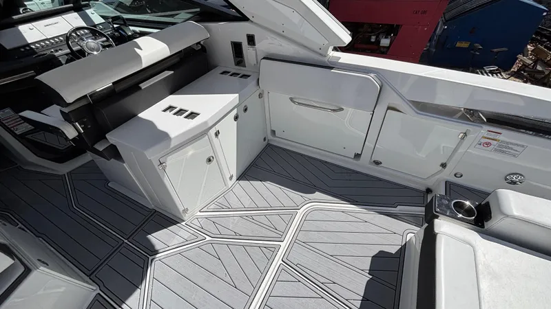 Slide: The Image of 2023 Monterey 385SS boat interior with sleek seating and modern design. - 7