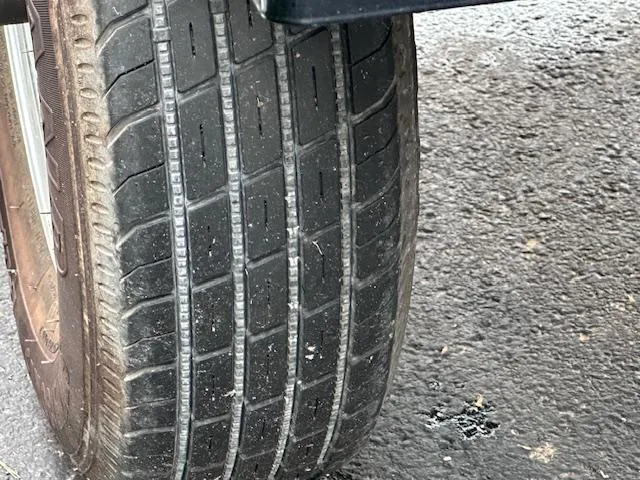 Slide: The Image of Close-up of a tire on a 2011 Sea-Doo RXT 260, showing tread pattern. - 16