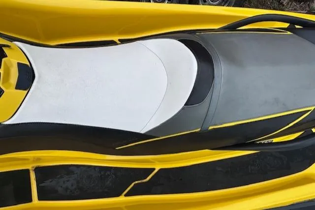 Slide: The Image of 2011 Sea-Doo RXT 260 jet ski, yellow and black seat detail. - 17