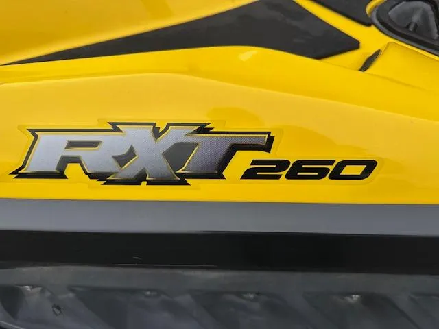 Slide: The Image of Yellow 2011 Sea-Doo RXT 260 jet ski with bold logo. - 5