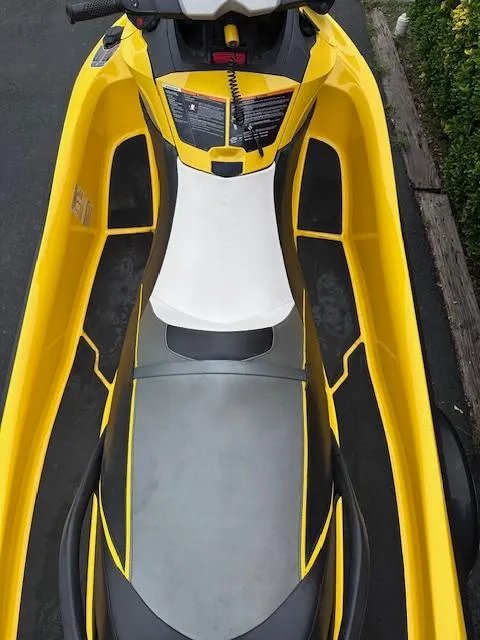 Slide: The Image of 2011 Sea-Doo RXT 260 jet ski, yellow and gray, top view. - 8