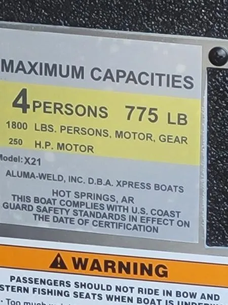 Slide: The Image of Boat capacity label for Xpress X21 Pro, 2023: 4 persons, 775 lbs, 250 HP motor. - 11