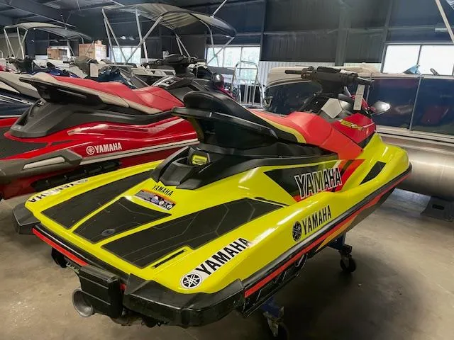 Slide: The Image of 2021 Yamaha WaveRunner EXR in vibrant yellow and red, displayed indoors. - 4