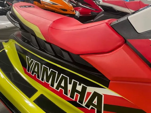 Slide: The Image of 2021 Yamaha WaveRunner EXR with vibrant red and yellow design. - 6