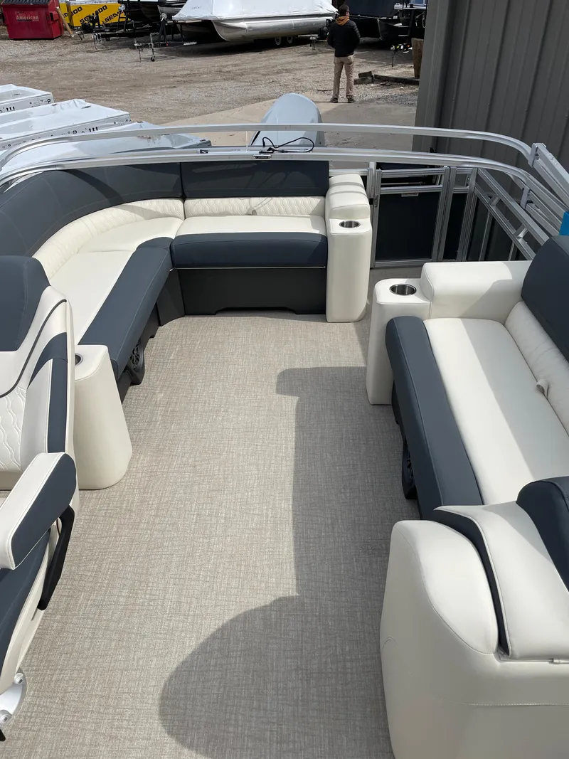 Slide: The Image of 2025 Avalon 23 LSZ Elite pontoon boat interior with plush seating and modern design. - 4