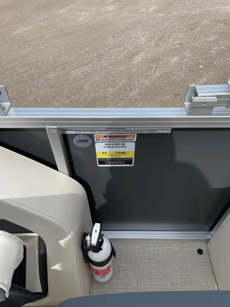 Slide: The Image of 2025 Avalon 23 LSZ Elite interior with safety label and fire extinguisher. - 5